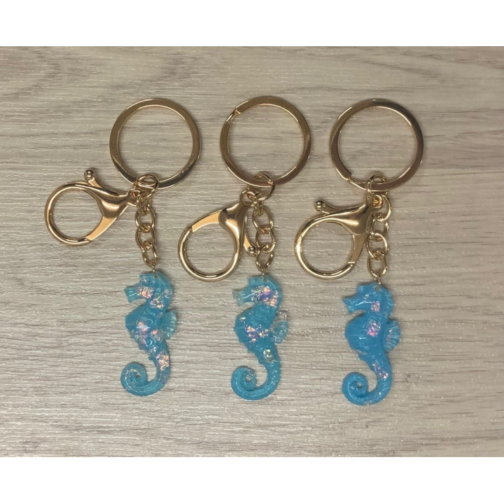 Porte clefs hippocampe bleu pailleté par 12